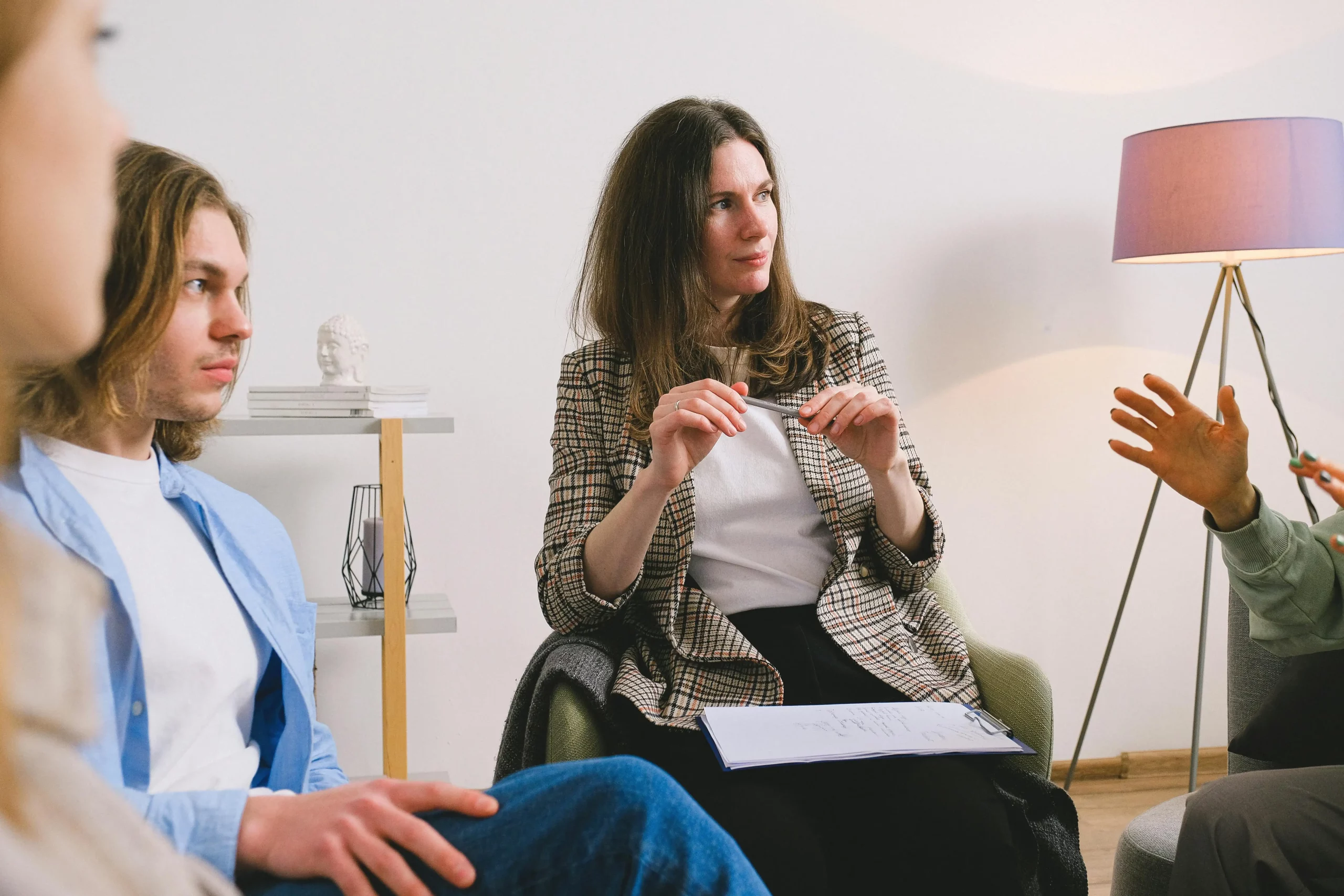 Women talking in a calm setting, symbolizing mental health awareness,