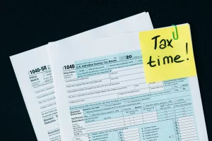 Business using a used payroll service with paper payroll and tax files