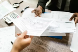 Tax return files and financial documents prepared for annual tax filing