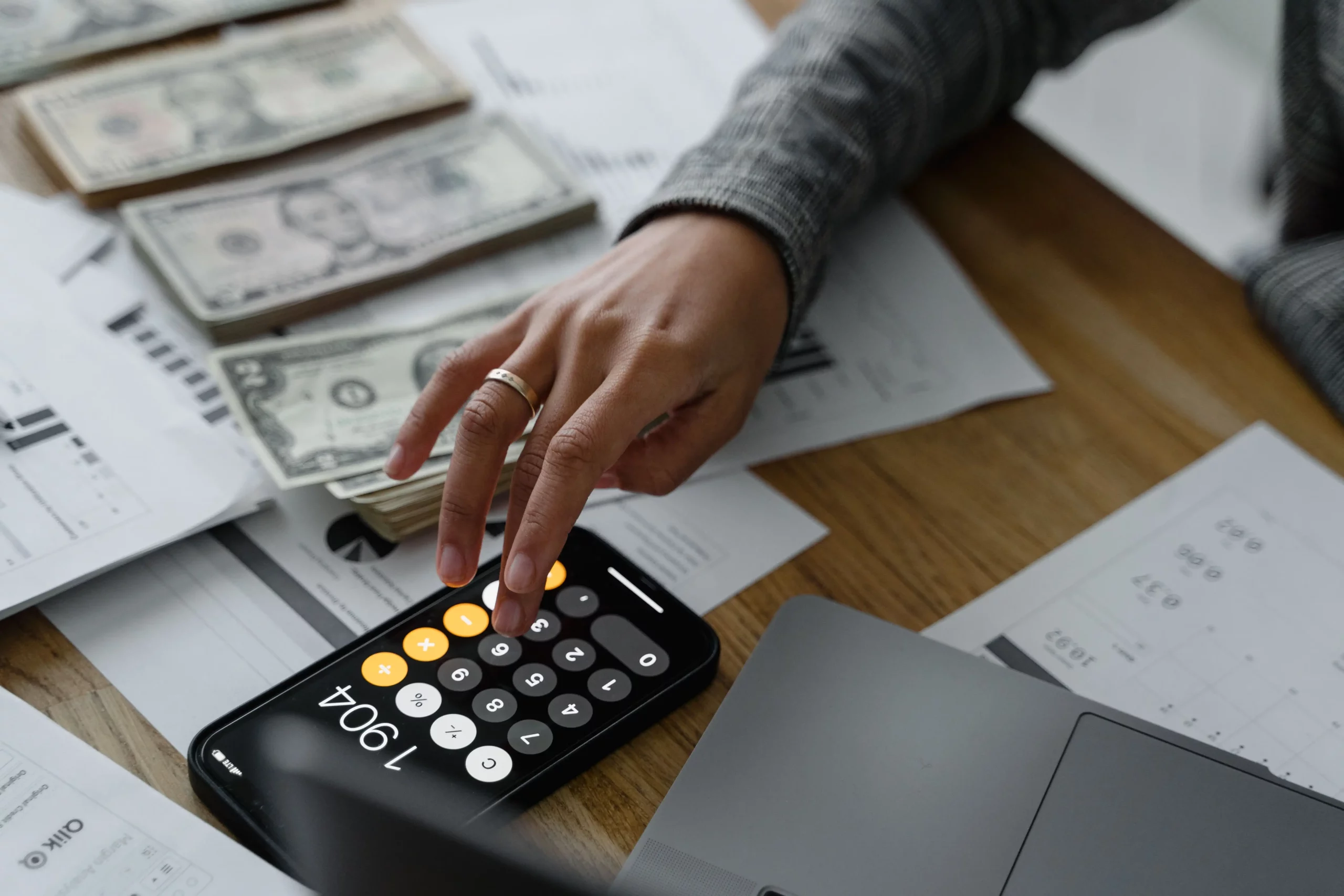 Payroll specialist processing employee salaries, deductions, and payroll reports