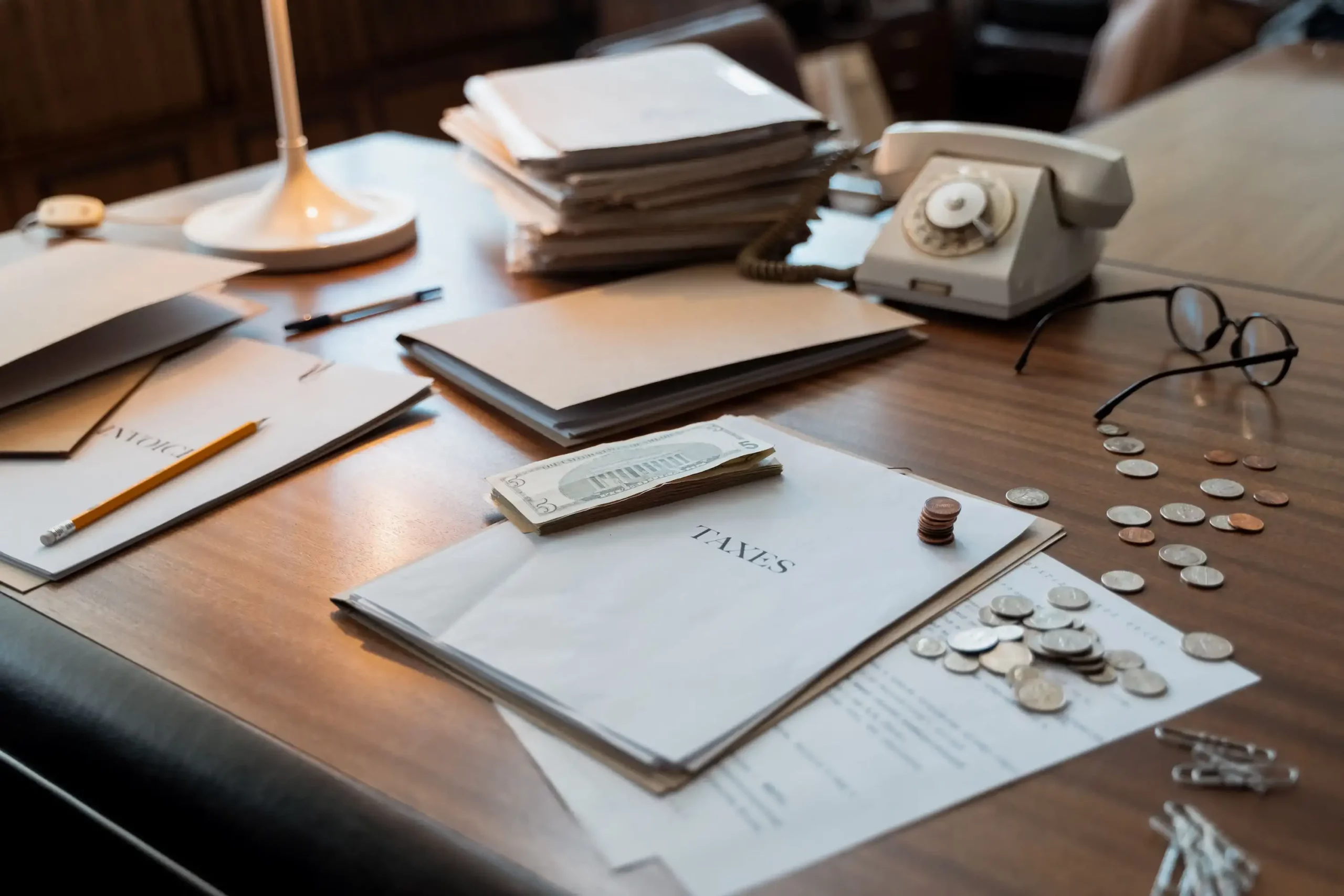 Tax files and documents illustrating overlooked tax deductions and tax-saving opportunities