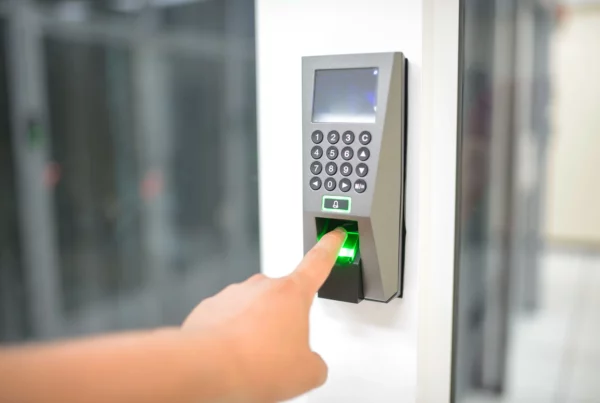 Fingerprint biometric scanner used to record employee attendance in a time tracking system